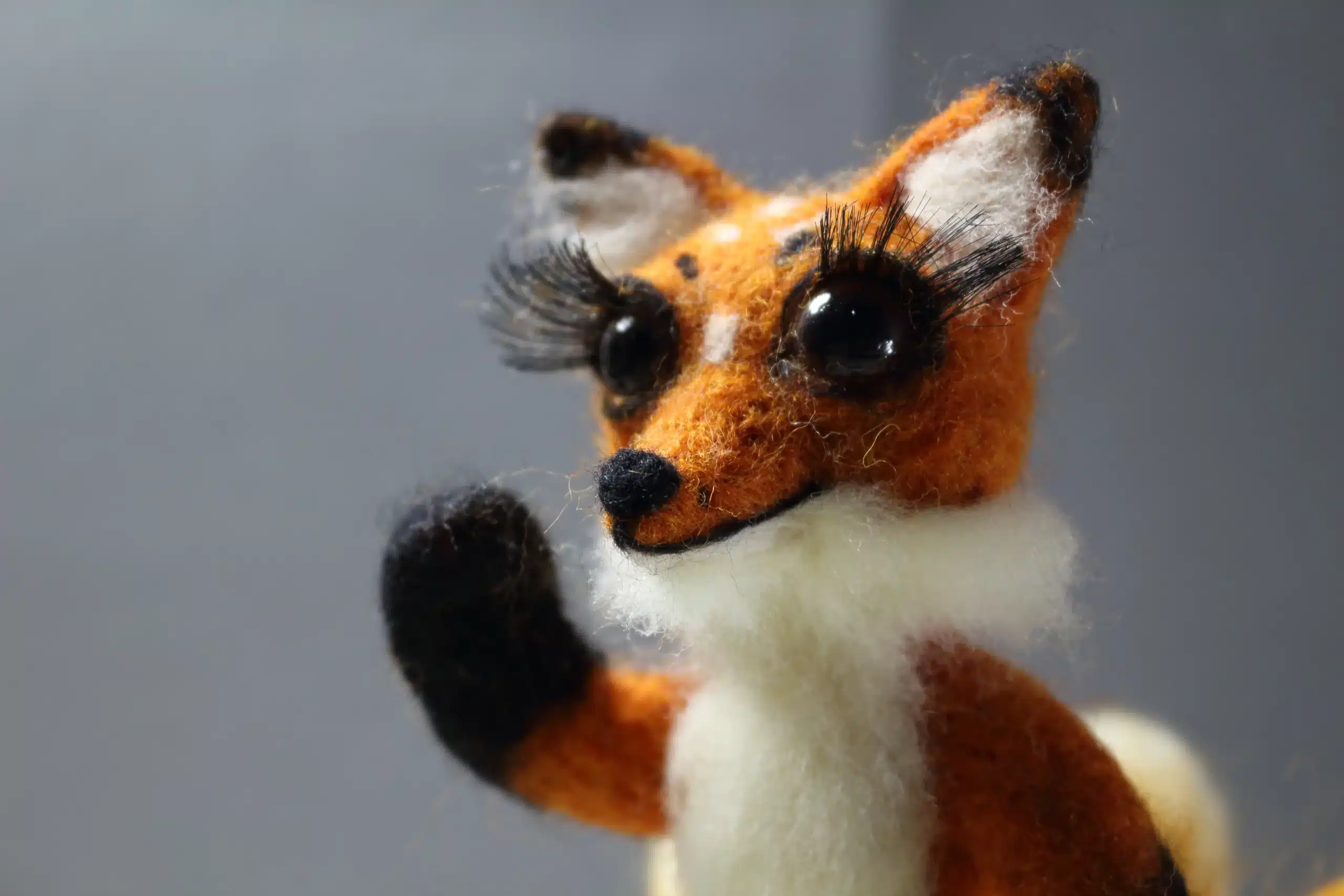 Three-tailed fox puppet.